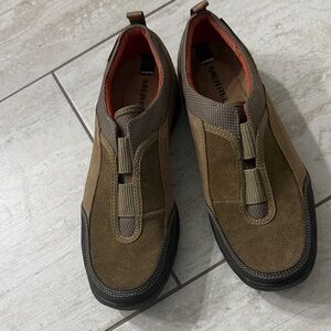 Merrell ladies size 9.5  Tan and Brown Slip-On Loafers
New ..authentic